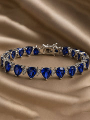 Original silver bracelet for ladies with blue triangle-cut zircon stones