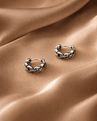 Silver hoop earrings for women with interlinked oval pattern design