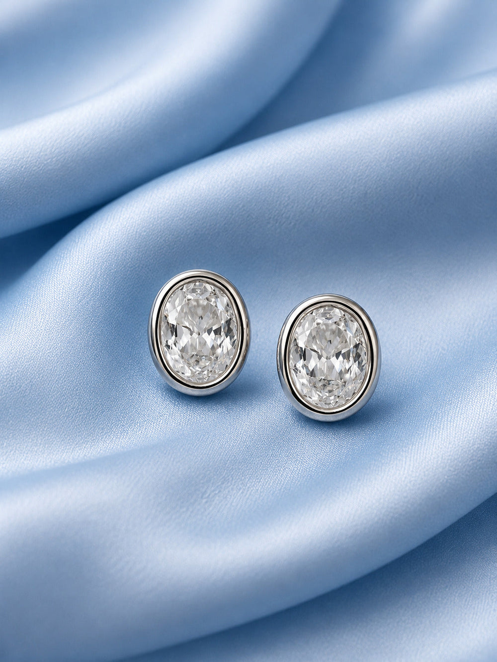 Sterling silver earrings for women with classic oval crystal design