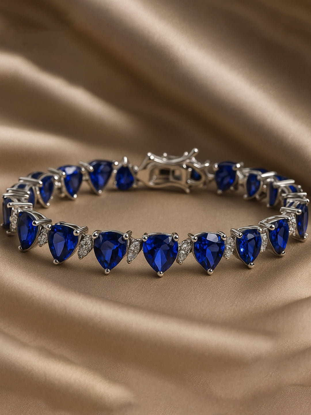 Original silver bracelet for ladies with blue triangle-cut zircon stones