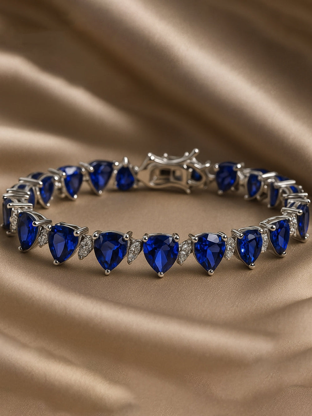 Original silver bracelet for ladies with blue triangle-cut zircon stones