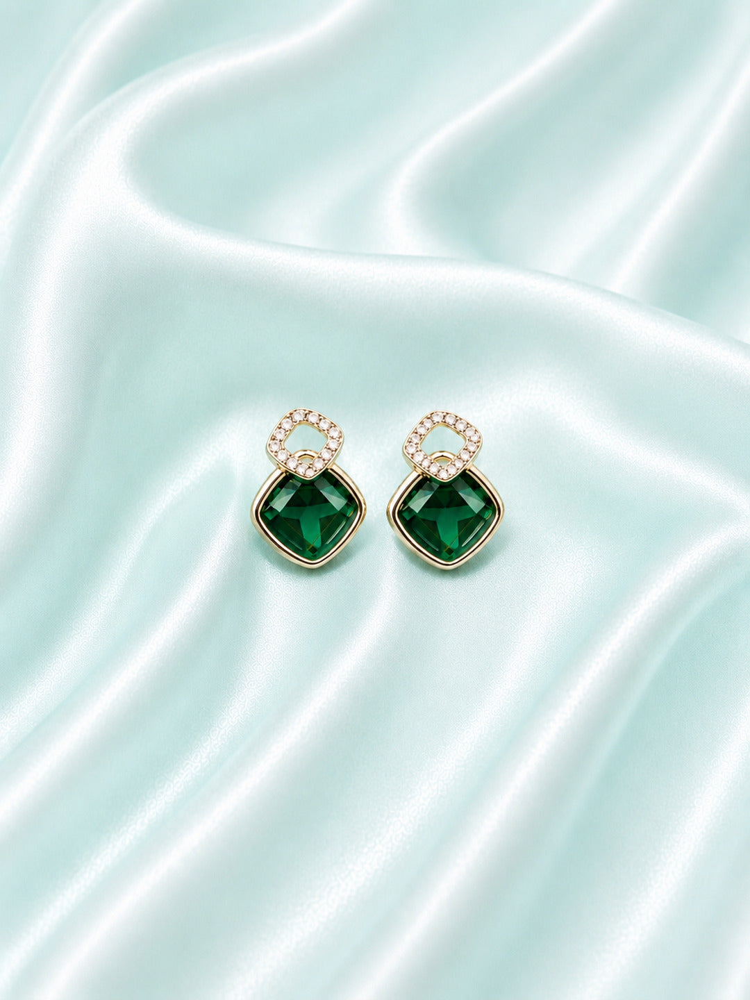 Sterling silver earrings for women with emerald green centre stone