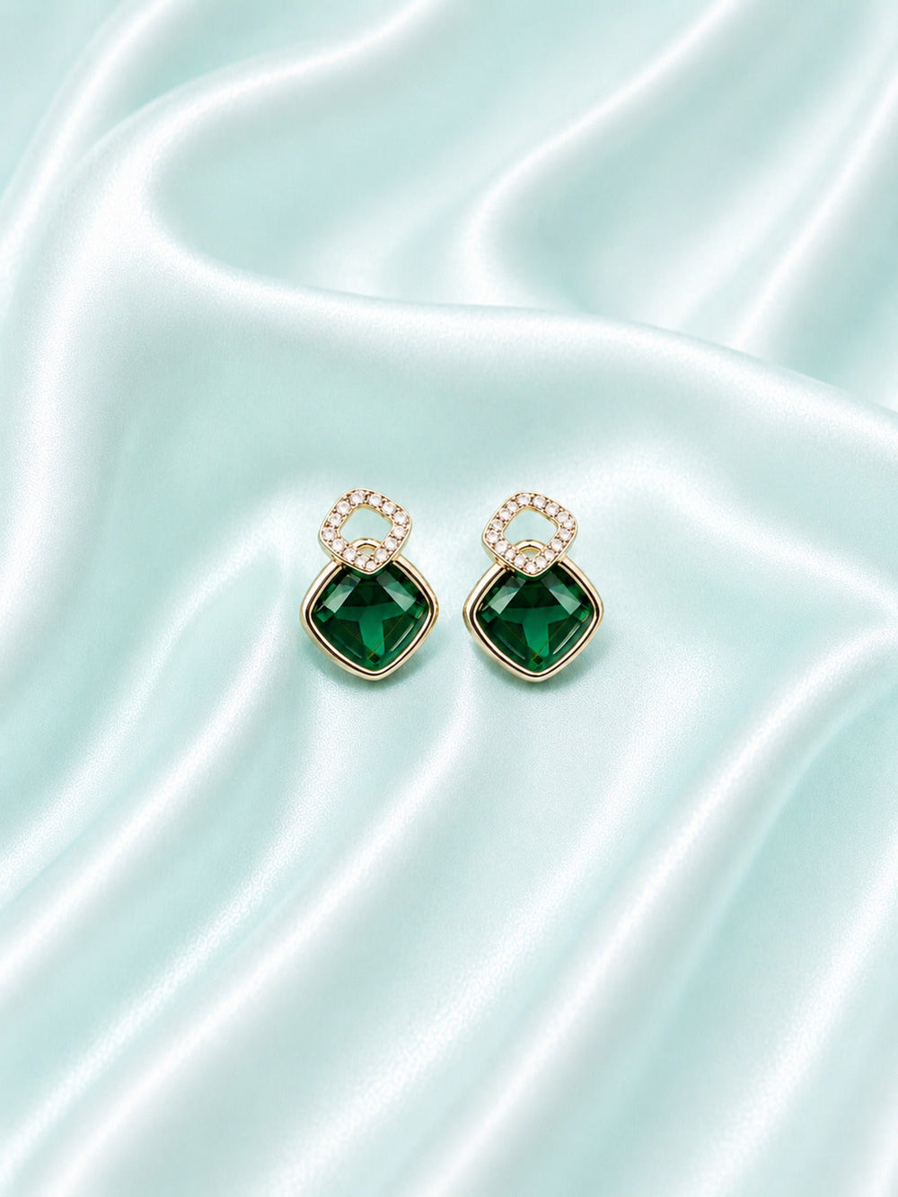 Sterling silver earrings for women with emerald green centre stone