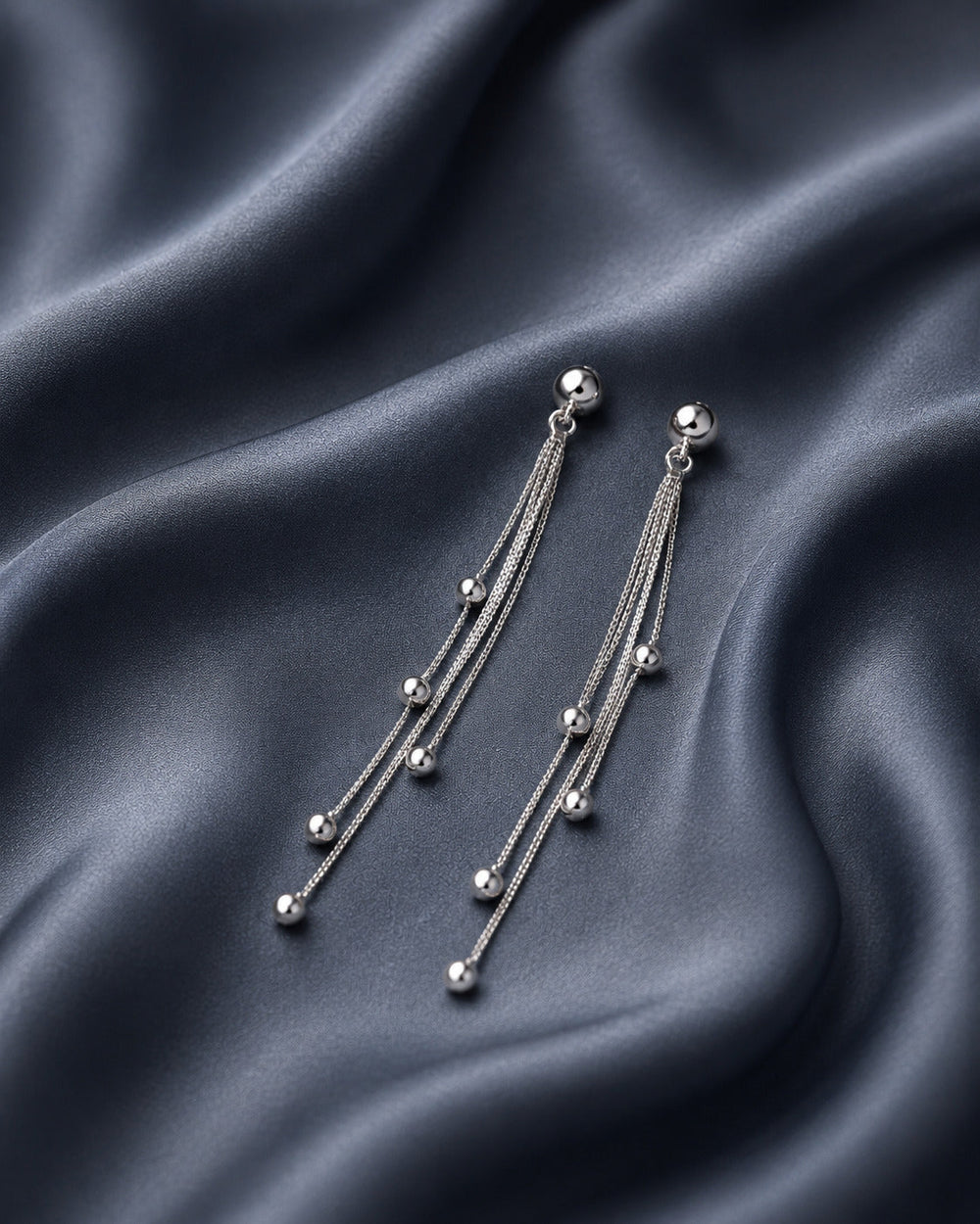 Sterling silver earrings for women with sleek ring and chain design