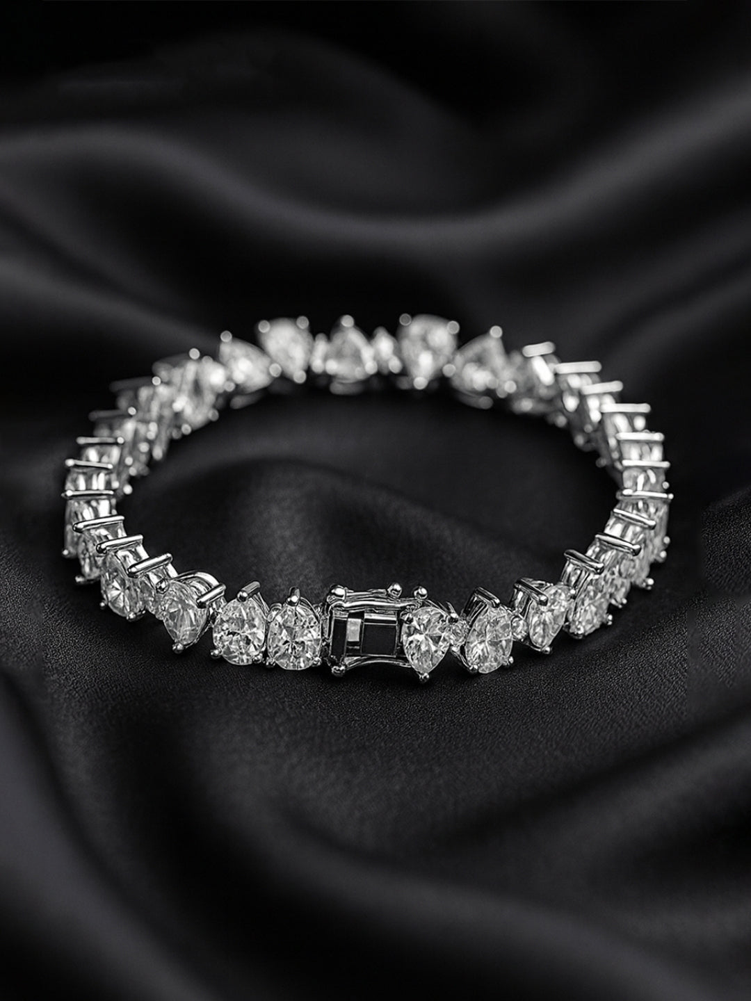 Original silver bracelet for ladies with triangle-cut zircon stones