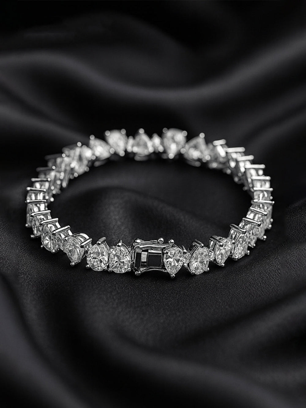 Original silver bracelet for ladies with triangle-cut zircon stones