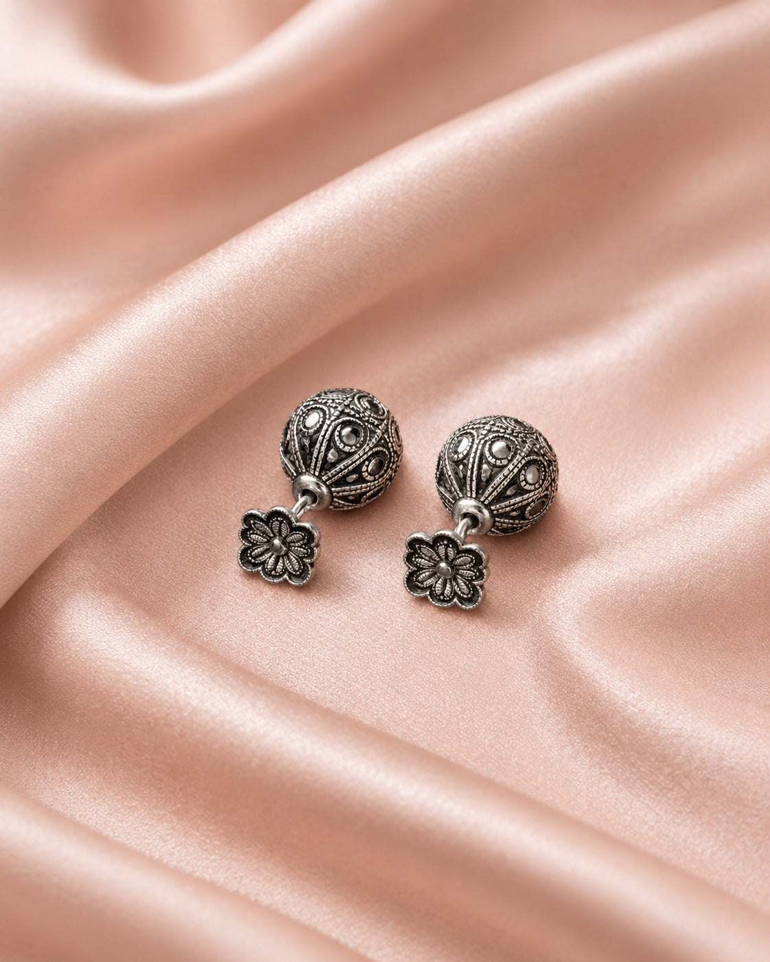 Oxidised silver earrings for women with floral ball stud design