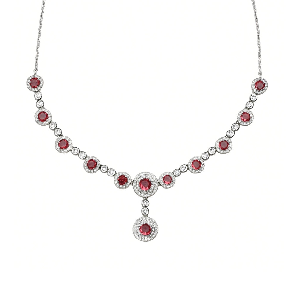 Silver necklace set for women with ruby red stones and matching earrings