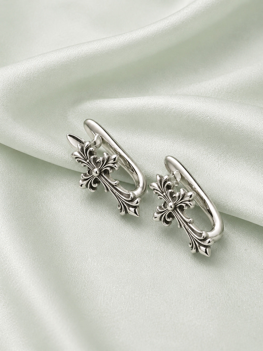 Silver hoop earrings for women with vintage cross design