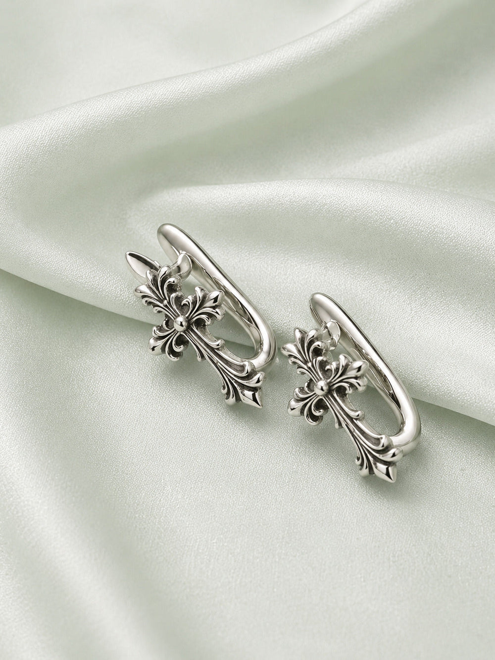 Silver hoop earrings for women with vintage cross design