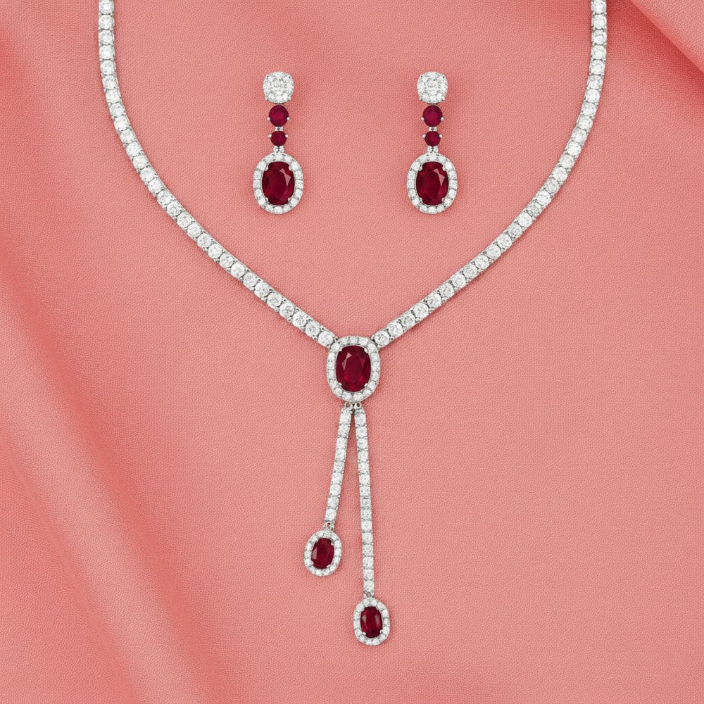 Silver necklace set for women with ruby red oval stones and earrings