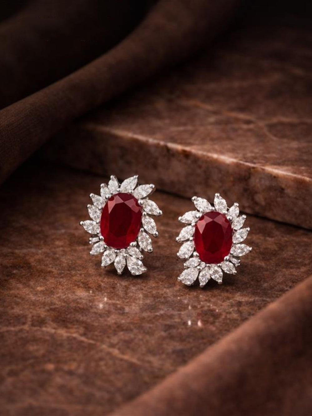 Sterling silver earrings for women with ruby red centre stone